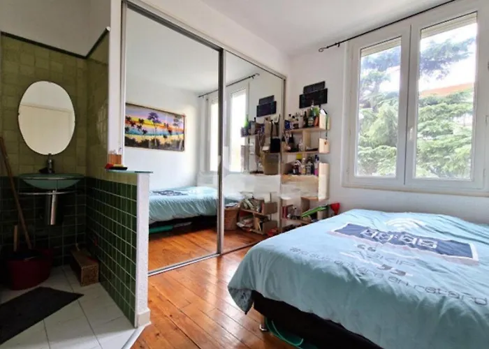 Confortable En Partage Séjour chez l'habitant *